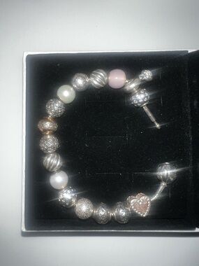 Pandora Silver essence Bracelet with 16 charms